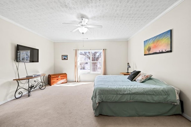 bedroom featuring a textured ceiling, carpet flooring, a ceiling fan, and crown molding