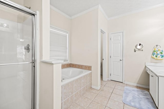 full bathroom featuring crown molding, a stall shower, a bath, and tile patterned floors