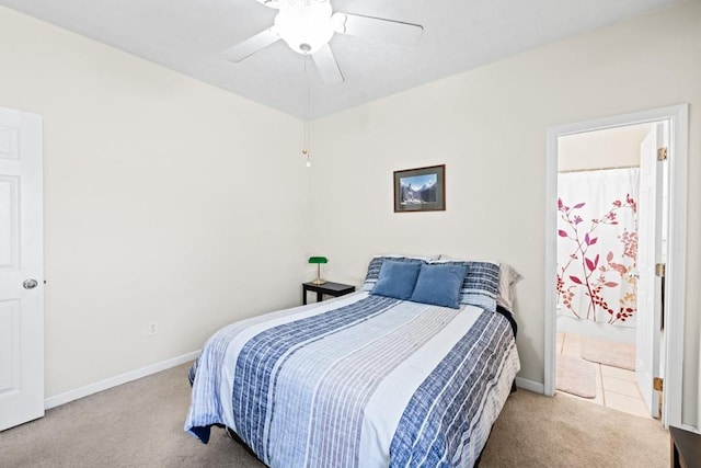 bedroom with ceiling fan, carpet, and baseboards