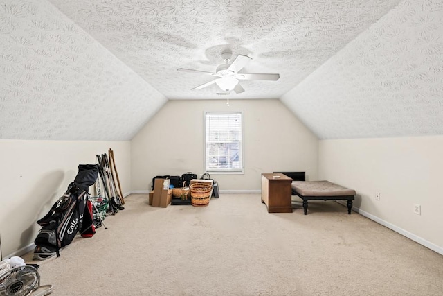 bonus room with carpet floors, baseboards, vaulted ceiling, and a textured ceiling