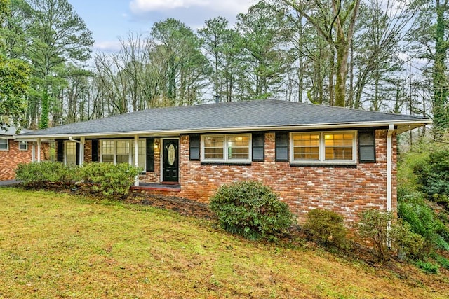 ranch-style house with a front yard