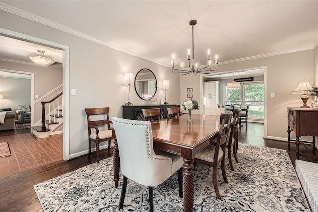 2917 Townley Cir, Atlanta, GA 30340 - dining room featuring baseboards, a chandelier, crown molding, stairway, and dark wood-type flooring