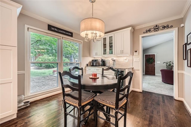 2917 Townley Cir, Atlanta, GA 30340 - dining area with dark wood-type flooring, a chandelier, ornamental molding, and baseboards