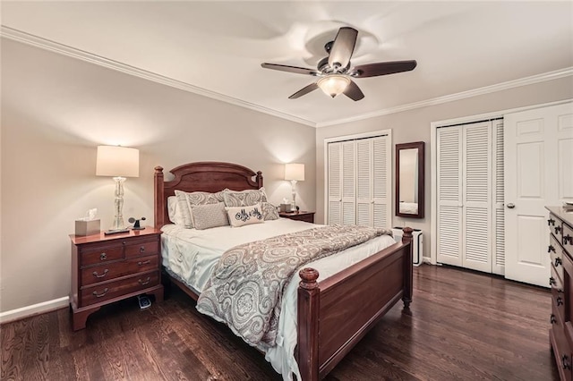 2917 Townley Cir, Atlanta, GA 30340 - bedroom with two closets, baseboards, dark wood-style flooring, crown molding, and a ceiling fan