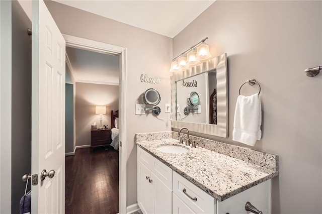 2917 Townley Cir, Atlanta, GA 30340 - ensuite bathroom featuring wood finished floors, vanity, and baseboards
