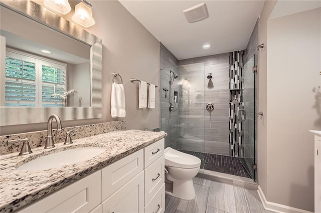 2917 Townley Cir, Atlanta, GA 30340 - full bathroom featuring toilet, a shower stall, vanity, and recessed lighting