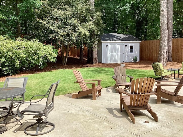 2917 Townley Cir, Atlanta, GA 30340 - view of patio with a shed, an outbuilding, and outdoor dining area