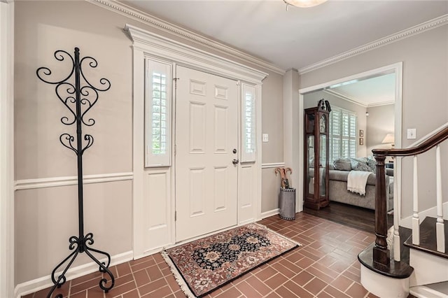 2917 Townley Cir, Atlanta, GA 30340 - entrance foyer with brick patterned floors, crown molding, baseboards, and stairway