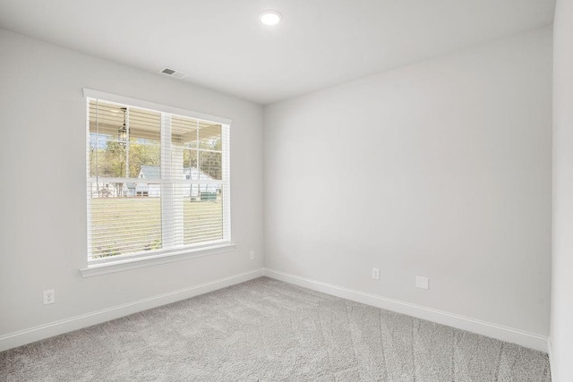 view of carpeted spare room