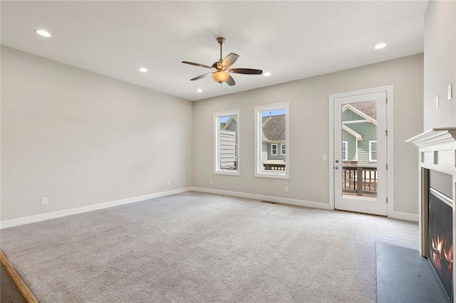 1954 Summit Trace Cir NW, Atlanta, GA 30318 - unfurnished living room with ceiling fan, carpet floors, a fireplace with flush hearth, and recessed lighting