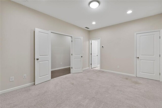 1954 Summit Trace Cir NW, Atlanta, GA 30318 - unfurnished bedroom with carpet and recessed lighting