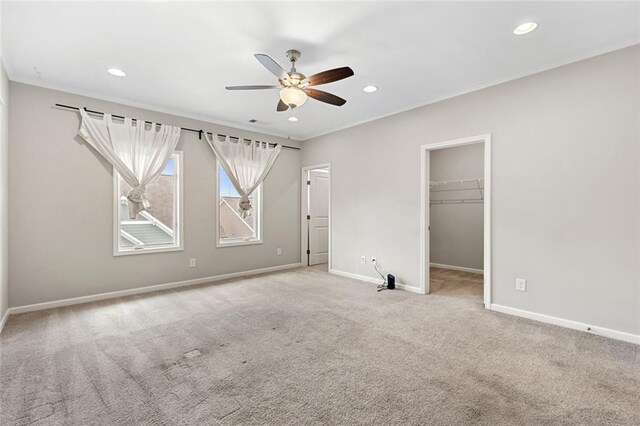 1954 Summit Trace Cir NW, Atlanta, GA 30318 - unfurnished bedroom featuring carpet, recessed lighting, a spacious closet, ceiling fan, and a closet