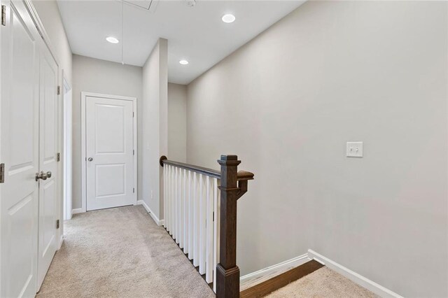 1954 Summit Trace Cir NW, Atlanta, GA 30318 - hallway with attic access, light carpet, an upstairs landing, and recessed lighting