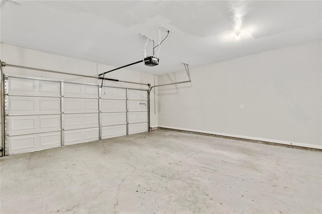 1954 Summit Trace Cir NW, Atlanta, GA 30318 - garage featuring a garage door opener and baseboards