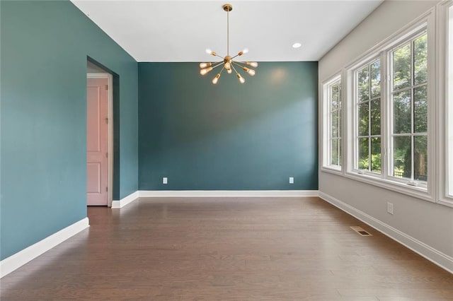 1954 Summit Trace Cir NW, Atlanta, GA 30318 - spare room featuring a chandelier, wood finished floors, and recessed lighting