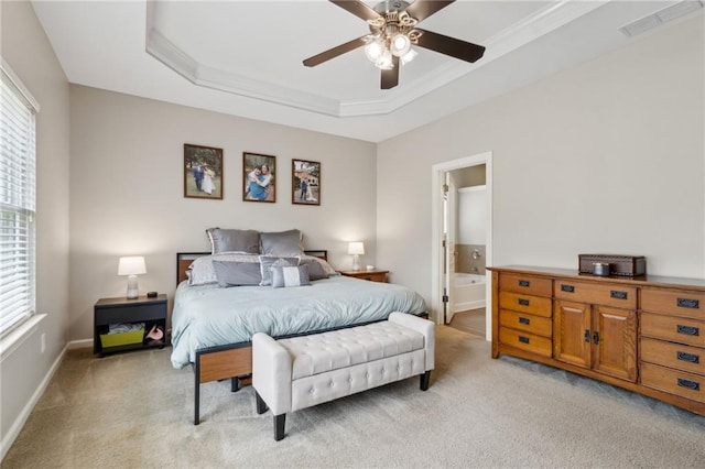 7927 Keepsake Ln, Flowery Branch, GA 30542 - bedroom with light carpet, crown molding, a raised ceiling, ensuite bath, and a ceiling fan