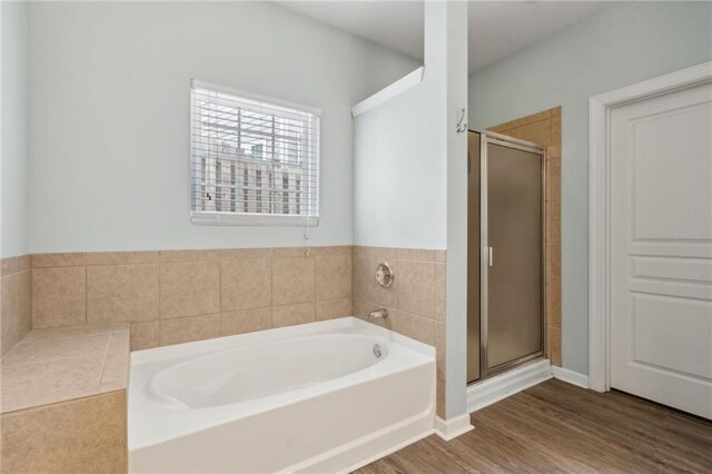7927 Keepsake Ln, Flowery Branch, GA 30542 - full bathroom featuring double vanity, wood finished floors, and connected bathroom