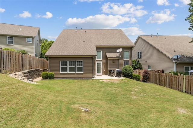 7927 Keepsake Ln, Flowery Branch, GA 30542 - rear view of house featuring a patio area, a fenced backyard, and roof with shingles