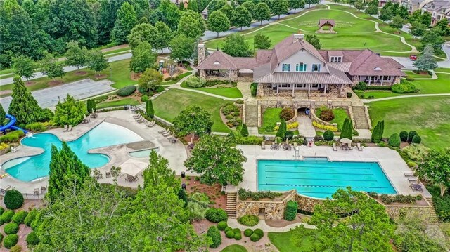 7927 Keepsake Ln, Flowery Branch, GA 30542 - drone / aerial view of a pool area