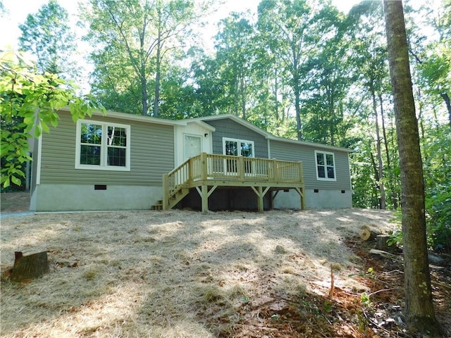 129 Lost Pl, Dahlonega, GA 30533 - view of front facade with crawl space and a deck
