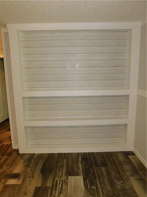 129 Lost Pl, Dahlonega, GA 30533 - detailed view of wood finished floors and baseboards