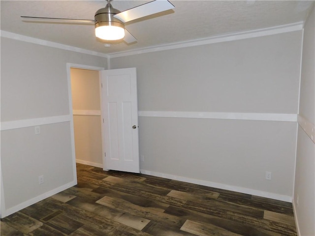 129 Lost Pl, Dahlonega, GA 30533 - spare room with dark wood-type flooring, ceiling fan, crown molding, and baseboards