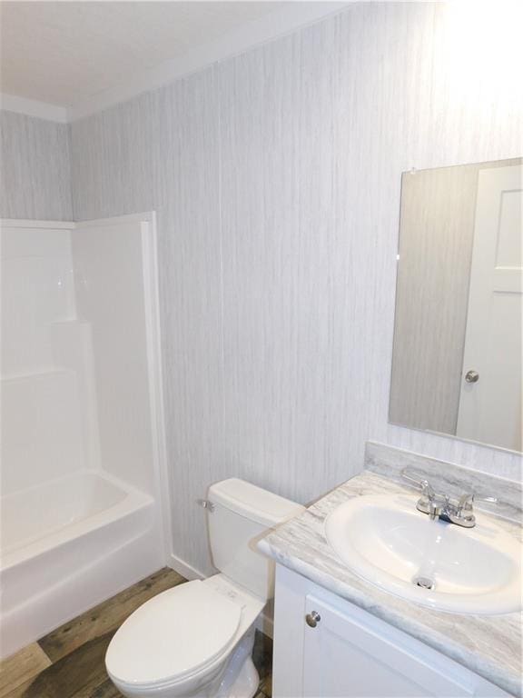 129 Lost Pl, Dahlonega, GA 30533 - bathroom with vanity, toilet, and tub / shower combination
