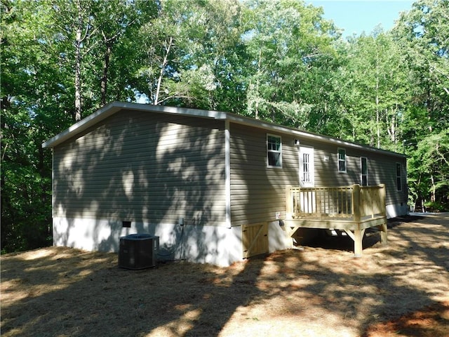 129 Lost Pl, Dahlonega, GA 30533 - view of property exterior featuring a wooden deck, central AC unit, and crawl space
