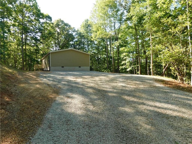 129 Lost Pl, Dahlonega, GA 30533 - view of side of property featuring crawl space and gravel driveway
