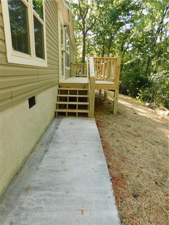 129 Lost Pl, Dahlonega, GA 30533 - view of side of property with a wooden deck