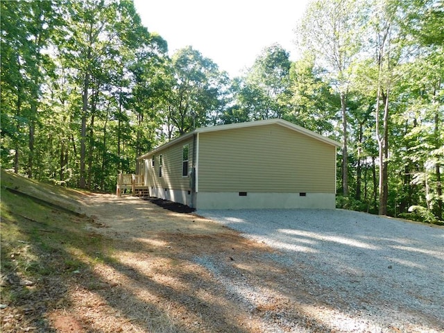 129 Lost Pl, Dahlonega, GA 30533 - view of side of property with crawl space and driveway