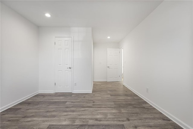 empty room featuring dark hardwood / wood-style floors