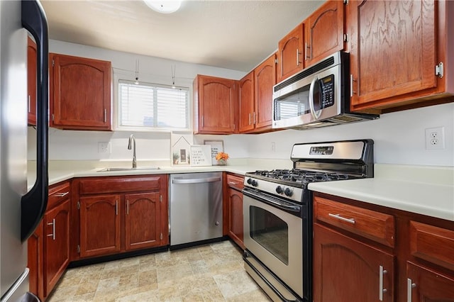 kitchen with sink and stainless steel appliances