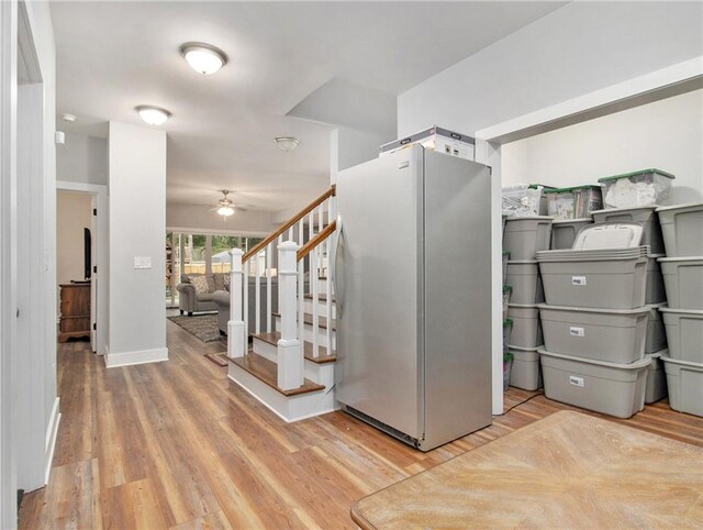 1033 Lanier Ave, Gainesville, GA 30501 - interior space with a ceiling fan, stairs, baseboards, and wood finished floors