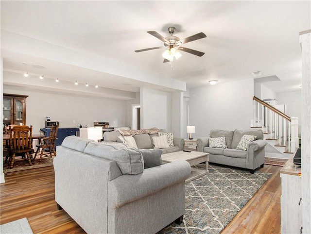 1033 Lanier Ave, Gainesville, GA 30501 - living area featuring stairs, ceiling fan, and wood finished floors