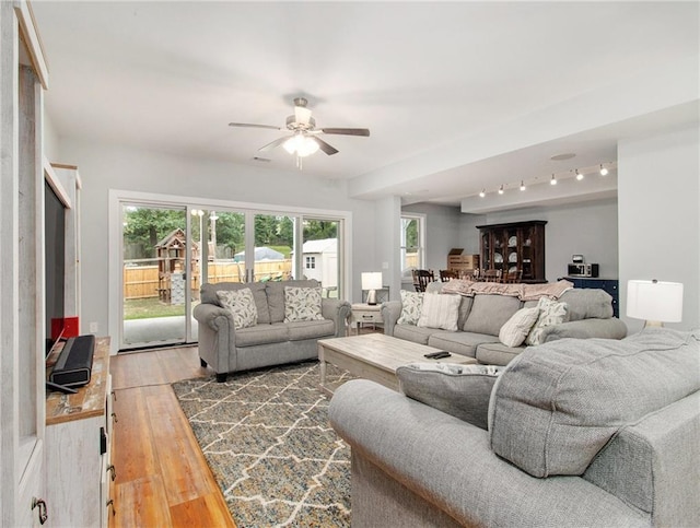 1033 Lanier Ave, Gainesville, GA 30501 - living area featuring a ceiling fan and hardwood / wood-style floors
