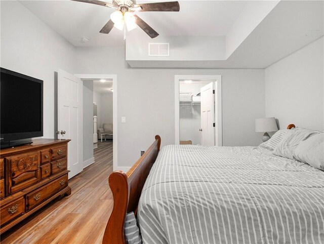 1033 Lanier Ave, Gainesville, GA 30501 - bedroom with a ceiling fan, baseboards, visible vents, and light wood finished floors