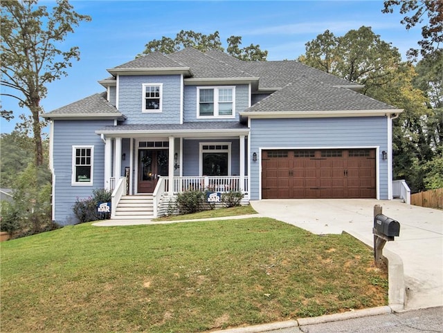 1033 Lanier Ave, Gainesville, GA 30501 - view of front of home featuring an attached garage, covered porch, fence, driveway, and a front yard