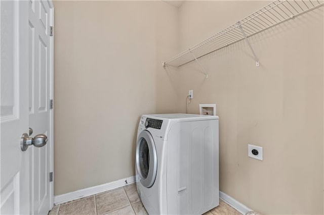 971 Reap Ln, Lawrenceville, GA 30043 - washroom with washer / dryer and baseboards