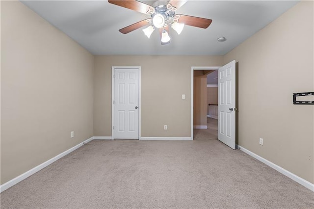 971 Reap Ln, Lawrenceville, GA 30043 - unfurnished bedroom featuring light carpet and ceiling fan