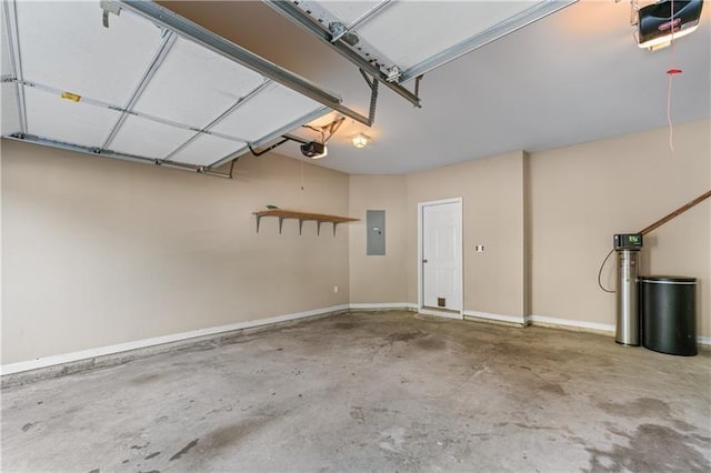 971 Reap Ln, Lawrenceville, GA 30043 - garage featuring electric panel and a garage door opener