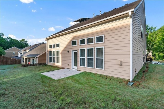 971 Reap Ln, Lawrenceville, GA 30043 - back of property featuring a lawn and a patio area
