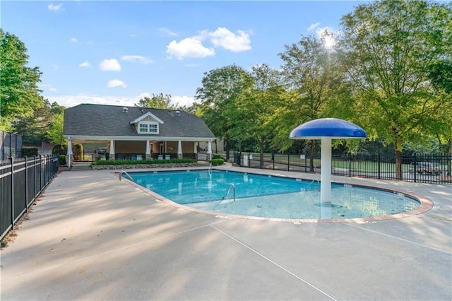 971 Reap Ln, Lawrenceville, GA 30043 - community pool featuring a patio