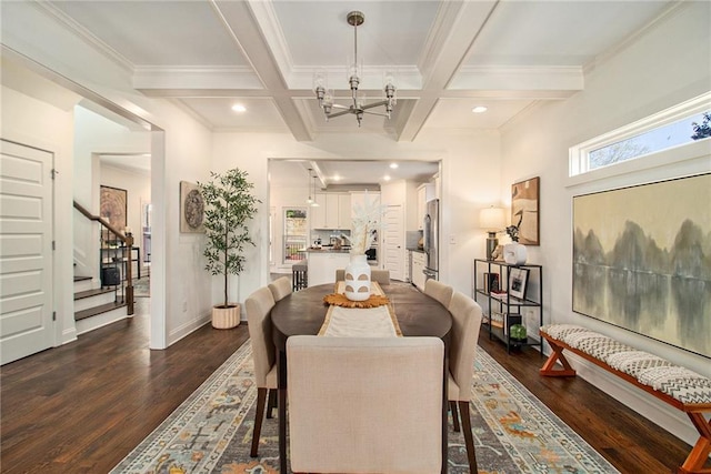 dining space with an inviting chandelier, stairway, dark wood-style flooring, and beam ceiling