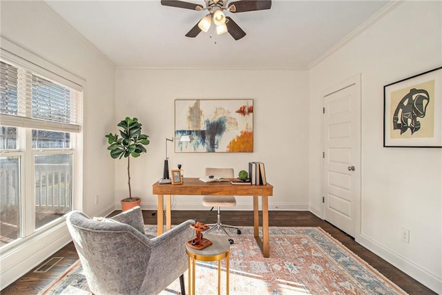 office area with dark wood-style floors, visible vents, baseboards, and ceiling fan