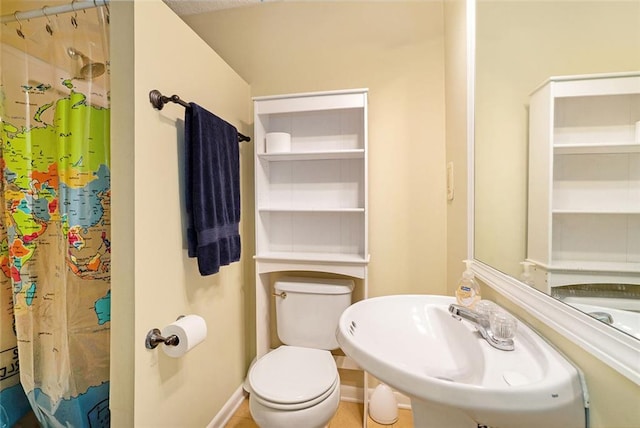5020 Huntshire Ln SW, Lilburn, GA 30047 - full bathroom with a sink and curtained shower