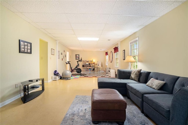 5020 Huntshire Ln SW, Lilburn, GA 30047 - living area with a paneled ceiling and tile patterned floors