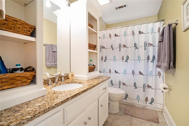 5020 Huntshire Ln SW, Lilburn, GA 30047 - full bath featuring vanity, tile patterned floors, and curtained shower