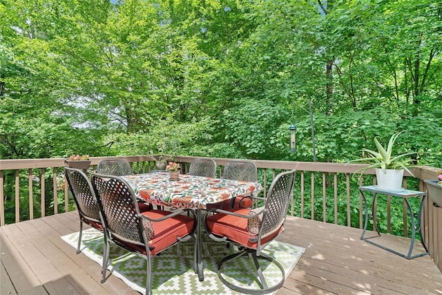5020 Huntshire Ln SW, Lilburn, GA 30047 - wooden deck featuring outdoor dining space
