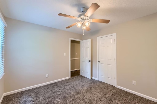 62 Sweetwater Pkwy, Powder Springs, GA 30127 - unfurnished bedroom featuring carpet, baseboards, and ceiling fan
